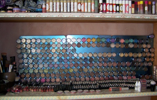 200+shadows, pretty much every lippie to be released (there's 125 lip products on the website right now- i have a lot more.) and all the balms(26- pomegranate not pictured because DH keeps stealing it- he needs one for his work pants and one for his coat and one for his car... lol)
