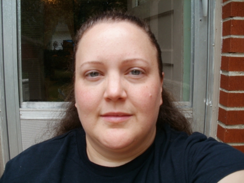 Outside, slightly overcast; face