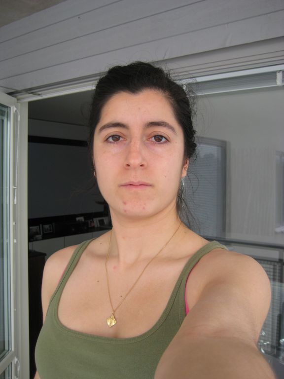 No makeup on at all, outside (on the balcony), no flash.