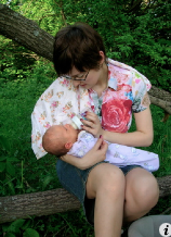 And here we're on our first walk outdoor. (It's my milk in the bottle)